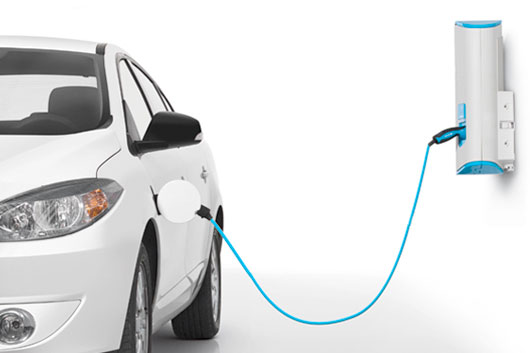 white car charging, plugged into EV charger with bright blue cord. White background.
