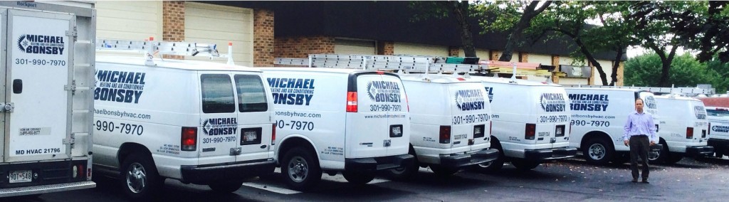 Michael Bonsby service trucks parked in a row.