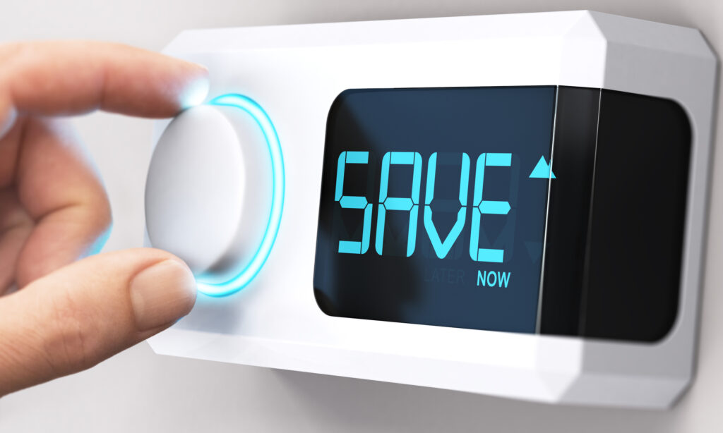 Hand turning a thermostat knob to increase savings by decreasing energy consumption. Composite image between a hand photography and a 3D background. Clifton, VA. Fort Myer, VA. Leesburg, VA. hvac replacement